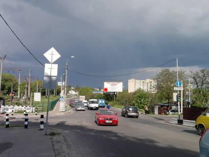 Billboard A in Khmelnitsky, 3*6  perehresta st.Knaza S.Horobrogo - st.I.Franka. nepodalik: zupinka, dekil'ka magaziniv avtozapcastin, privatna zabudova (vid centru) Photo 1