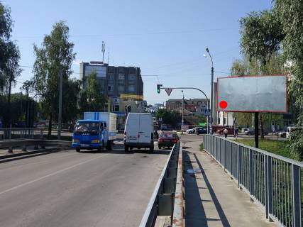 Billboard A in Khmelnitsky, 3*6  st.Pribuz'ka, v rajoni mostu na "Epicentr" ta TRC "Oazis". nepodalik:  "Epicentr", TRC "Oazis", supermarket "TavriaV" ta "Sil'po", bezlic dribnih magaziniv ta komercijnih ob'ektiv (centr) [v centr, vid Epicentru] Photo 1