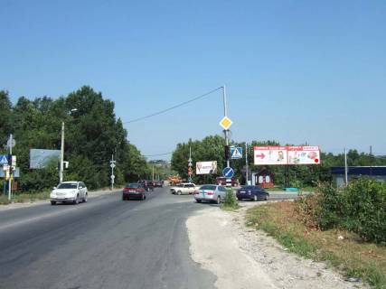 Billboard A in Khmelnitsky, 3*6  perehresta st.Z.Okruzna - st.Geologov. nepodalik: osnovnij zaizd na rinki, STO, mijka, sinomontaz, AZS, Gazova AZS, elitna zabudova (vid centru, na rinki) [prave vuho] Photo 1