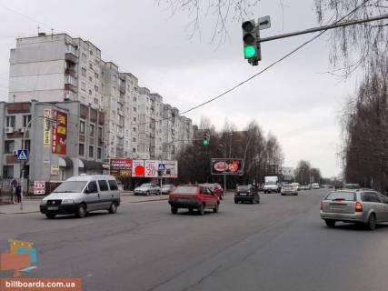 Billboard B in Khmelnitsky, 3*6  st.Pribuz'ka, 6 (mist na "EpicentrK"). nepodalik: "Epicentr", supermarket "Tavria V", "Sil'po", TRC "Oazis", central'nij rinok, elitna zabudova "Nabereznij kvartal" (centr) [live vuho] Photo 1