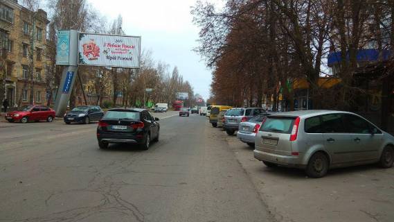 Billboard B in Kherson Universitets'ka st./Supermarket Fres Photo 1