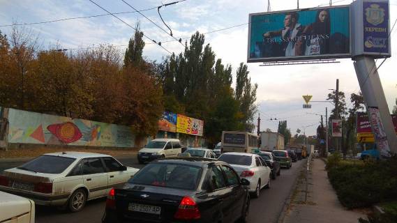 Billboard A in Kherson Mikolaivs'ke sose (r-n zaliznicnogo mostu No1)/Peremogi pl. Photo 1