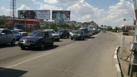 Billboard B in Kherson, 3х6 м.  Parovozna st.- Berislavs'ke sose (pereizd)/pravij Photo 1
