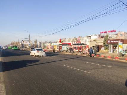 Billboard A in Kharkiv, 1,24х1,84  Uvilejnij pr-t, 55-A (1) (zupinka prospekt Traktorobudivnikiv), v centr Photo 1