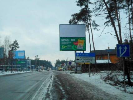 Billboard A in Bucha, 6х3  m. Buca, trasa M-07 "Kiiv-Kovel'", km 25+850 pravo, st. Sevcenka, v'izd v Bucu, restoran "Zima Bar", restoran "Rim", za 250m do AZS Shell, AZS UPG verh Photo 1