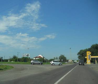 Billboard A in Pereyaslav (Pereyaslav-Khmelnitsky) Cerkas'ka trasa, KPP DAI m. Pereaslav-Hmel'nic'kij, v'izd v misto, N-08 km 43+900 kil'ce, restoran "Hutorec'", AZS "BRSM" Photo 1