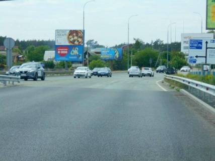 Billboard B in Irpin, 6х3  m. Irpin', trasa M-07 "Kiiv-Kovel'", km 23+400 livo, st. Svato-Pokrovs'ka, 2a, za mostom cerez r. Irpinka, navproti ofisu ZK "Gostomel' Rezidens", za 350m do rozvilki Irpin'-Buca-Gostomel', za 150m do AZS OKKO, niz Photo 1