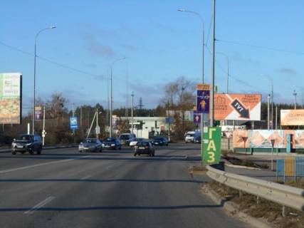 Billboard A in Irpin m. Irpin', trasa M-07, km 23+450 pravo, pisla ofisu ZK "Gostomel' Rizidens", 125m do AZS OKKO, 300m do rozvilki  Irpin'-Buca-Gostomel' Photo 1