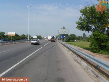 Billboard A in With. Mila, 6х3  trasa M-06 "Kiiv-Cop" (Zitomir), km 26+160 pravo, magazin "Fora", restoran "Kozacok" Photo 1