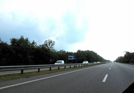 Billboard B in Kiev roads, 6х3  Trasa M-06 "Kiiv-Cop" (Zitomir), km 42+850 livo, za 650m do povorotu na Motizin, povorot na kotedzne mistecko "Nimec'ka sloboda" Photo 1