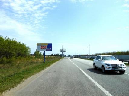 Billboard B in With. Mila, 6х3  s. Mila, trasa M-06 "Kiiv-Cop" (Zitomir), km 27+100 pravo, za 350m do restoranu "Dva bobra", cerez 300m pisla AZS GLUSCO Photo 1