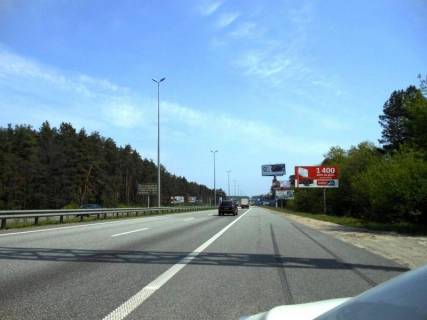 Billboard A in Parking s. Stoanka, trasa M-06 "Kiiv-Cop" (Zitomir), km 22+575 livo, 375m do AZS GLUSCO, 700m do AZS KLO, pered rozv'azkou na Irpin', Bilogorodku  Photo 1