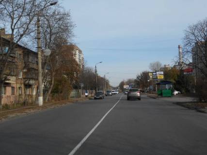 Billboard A in Brovary, 6х3  m. Brovari, st. Aroslava Mudrogo, 84-86, cerez 40m pisla avtobusnoi zupinki, za 110m do povorotu na st. Grusevs'kogo ta Parku Peremogi Photo 1