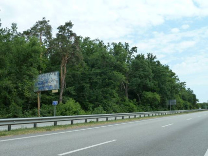 Billboard B in With. Mila, 6х3  с. Мила, траса М-06 "Київ-Чоп" (Житомир), км 27+950 право, за 550м до АЗС GLUSCO та UPG Photo 1