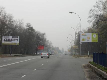 Billboard A in Brovary, 6х3  m. Brovari, st. Kiivs'ka, navproti budinku 302, cerez 170m pisla magazinu "Epicentr" ta magazinu "Novus", cerez 25m pisla povorotu na st. Kozac'ka, za 220m do povorotu do ZK "Lisovij kvartal", za 340m do magazinu "Sil'po" Photo 1