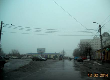 Billboard B in Uman, 6х3  m. Uman', rozv'azka z st. Kiivs'ka, st. Tisika ta st. Sevcenka (klumba), bila Avtovokzalu, navproti magazinu ATB, za 200m do AZS SOCAR Photo 1