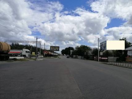 Billboard A in Kalynivka, 6х3  smt. Kalinivka, perehresta st. Zaliznicna ta avtoslahu T-1038, navproti avtobusnoi zupinki, bila AZS MOTTO, cerez 100m pisla povorotu na prov. Ukrains'kij, za 500m do AZS MARSEL Photo 1