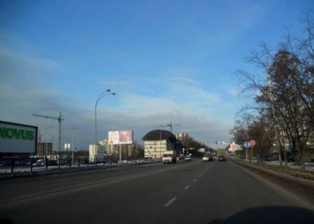 Billboard B in Brovary, 6х3  m. Brovari, st. Kiivs'ka, navproti budinku 312, bila magazinu "Epicentr" ta magazinu "Novus", cerez 100m pisla avtobusnoi zupinki, cerez 305m pisla povorotu na st. Kozac'ka, za 50m do povorotu na st. Vasila Simonenka ta st. Korolenka Photo 1