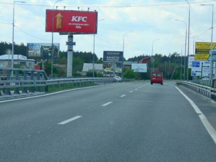 Billboard B in Irpin, 6х3  м. Ірпінь, траса М-07 "Київ-Ковель", км 23+300 ліво, міст через р. Ірпінка, в'їзд у місто, за 275м до АЗС ОККО, через 500м після магазину АТБ, через 550м після магазину ФОРА Photo 1