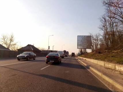Billboard A in Gostomel, 6х3  smt. Gostomel', trasa M-07 "Kiiv-Kovel'", km 22+650 pravo, st. Kulisova, 39, pered povorotom na s. Gorenka, za 175m do avtobusnoi zupinki "Gorenka", za 240m do magazin "Fora", verh Photo 1