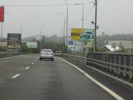 Billboard A in Irpin, 6х3  м. Ірпінь, траса М-07 "Київ-Ковель", км 23+300 право, міст через р. Ірпінка, в'їзд у місто, за 275м до АЗС ОККО, через 500м після магазину АТБ, через 550м після магазину ФОРА Photo 1