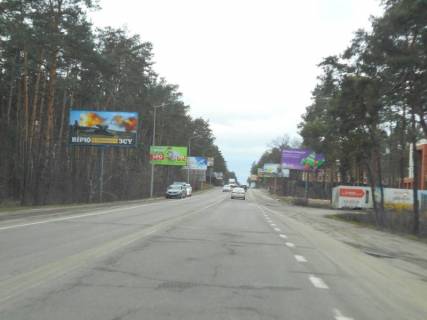 Billboard B in Bucha, 6х3  m. Buca, trasa M-07 "Kiiv-Kovel'", km 24+650 livo, st. Sevcenka, v'izd v Bucu z Gostomela, cerez 500m pisla rozv'azki Irpin'-Gostomel'-Kiiv Photo 1