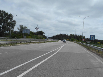 Billboard B in Ivankiv, 6х3  с. Іванків, харківська траса, траса М-03 "Київ-Харків", км 47+600 ліво, біля АЗС Sun Oil, через 1км після автобусної зупинки та повороту на вул. Пролетарська, за 800м до АЗС GLUSCO та повороту на вул. Любарецька Photo 1