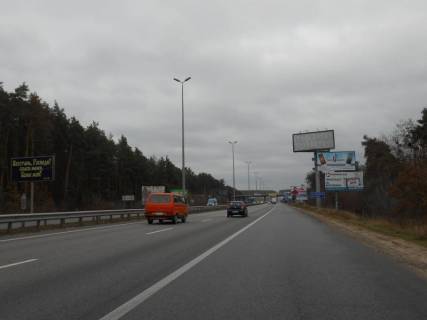 Billboard A in Parking s. Stoanka, trasa M-06 Kiiv-Cop (Zitomir), km 22+450 livo, v'izd v s. Stoanka, 250m do AZS GLUSCO, verh Photo 1
