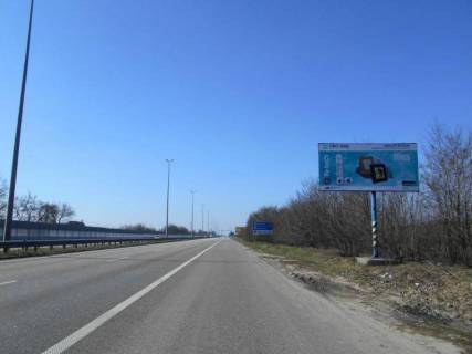 Billboard A in Mriya, 6х3  s. Mria, trasa M-06 "Kiiv-Cop" (Zitomir), km 29+250 pravo, cerez 400m pisla povorotu na Spit'ki, za 500m do "Camper group" Photo 1