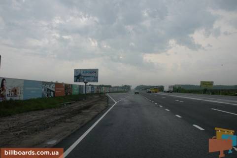 Billboard B in With. Mila, 6х3  s. Mila, trasa M-06 "Kiiv-Cop" (Zitomir), km 26+950 livo, cerez 150m pisla restoranu "Dva Bobra", za 475m do AZS GLUSCO Photo 1