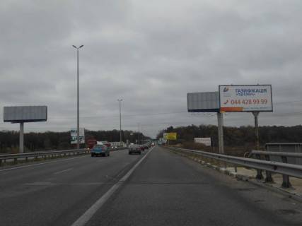 Billboard A in Parking s. Stoanka, trasa M-06 Kiiv-Cop (Zitomir), km 21+125 livo, mist cerez r. Irpinka, v'izd v m. Kiiv, 375m do AZS Marshal Photo 1