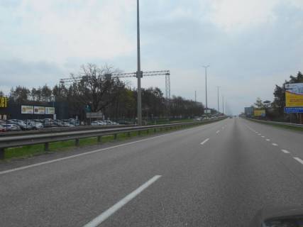 Billboard A in Kapitanivka, 6х3  trasa M-06 "Kiiv-Cop" (Zitomir), km 24+500 livo, cerez 320m pisla AZS AMIS ta povorotu na Vorzel', cerez 180m pisla Mega Marketu Photo 1