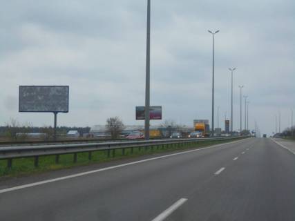 Billboard B in Mriya, 6х3  s. Mria, trasa M-06 "Kiiv-Cop" (Zitomir), km 30+100 pravo, za 450m do "Camper group" Photo 1