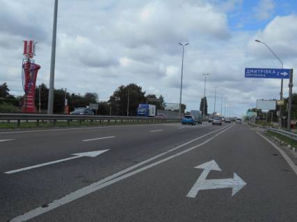 Billboard B in With. Mila, 6х3  trasa M-06 "Kiiv-Cop" (Zitomir), km 25+770 livo, bila avtobusnoi zupinki, za 400m do magazinu "Fora", povorot na Dmitrivku Photo 2