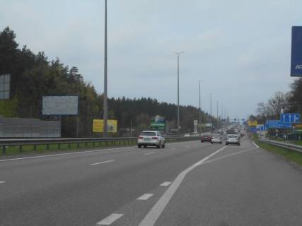 Billboard B in Kapitanivka, 6х3  s. Kapitanivka, trasa M-06 "Kiiv-Cop" (Zitomir), km 24+500 livo, za 320m do AZS AMIS ta povorotu na Vorzel', za 180m do Mega Marketu Photo 1