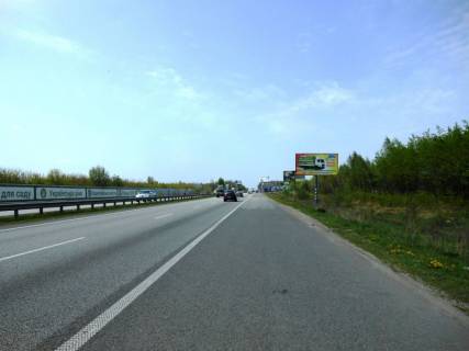 Billboard A in With. Mila s. Mila, trasa M-06 Kiiv-Cop (Zitomir), km 27+100 pravo, 350m za restoranom "Dva bobra", 300m do AZS GLUSCO Photo 1