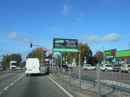 Billboard A in Gostomel, 6х3  смт. Гостомель, траса М-07 "Київ-Ковель", км 22+850 право, вул. Кулішова, 44 (вул. Садова, 2), перед поворотом на с. Горенка, парковка магазину "Фора" Photo 1