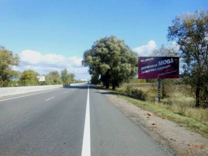 Billboard A in Kalynivka smt. Kalinivka, trasa M-05 Kiiv-Odesa, km 34+655 livo, cerez 540m pisla rozv'azki na m. Vasil'kiv ta smt. Kalinivka Photo 1