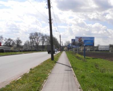 Billboard A in Uman m. Uman', st. Internacional'na, navproti 4/2, cerez 450m pisla viizdu na trasu Kiiv-Odesa, za 85m do avtobusnoi zupinki ta 110m do povorotu na st. Vil'amsa Photo 1