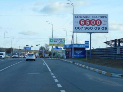 Billboard A in Gostomel, 6х3  м. Гостомель-м. Ірпінь, вул. Шевченка-вул. Свято- Покровська (навпроти №22-А), траса М-07, км 23+700 ліво, перед Ірпінським кільцем, біля Сіті Маркету, зупинка Photo 1