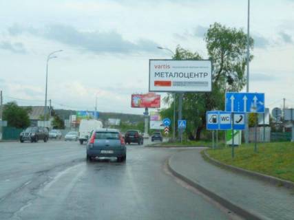 Billboard A in Gostomel, 6х3  м. Гостомель-м. Ірпінь, вул. Шевченка-вул. Свято- Покровська (навпроти №10), перетин з вул. Гайдамацька, траса М-07, км 23+550 ліво, біля АЗК ОККО, Сіті Маркет Photo 1