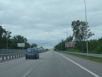 Billboard A in Ivankiv, 6х3  s. Ivankiv, harkivs'ka trasa, trasa M-03 "Kiiv-Harkiv", km 45+720 livo, pered KPP DAI m. Borispil', za 370m do AZS OKKO, cerez 120m pisla povorotu na st. Dzerzins'kogo Photo 1