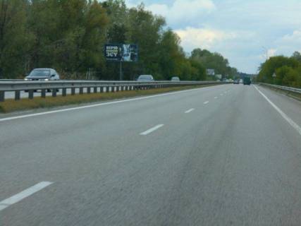 Billboard B in Obukhiv, 6х3  Dniprovs'ke sose, trasa N-01 "Kiiv-Znam'anka", km 42+650 pravo, cerez 450m pisla rozv'azki na m. Obuhiv ta m. Ukrainka Photo 1