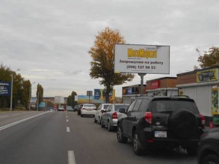 Billboard A in Obukhiv, 6х3  m. Obuhiv, st. Kiivs'ka, 168, navproti rinku ta zitlovogo kompleksu "Nektarnij", cerez 70m pisla povorotu do supermarketu "Velmart" Photo 1