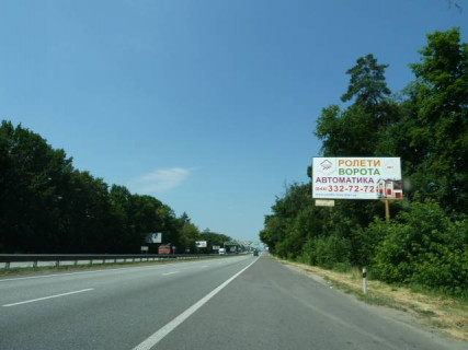 Billboard A in With. Mila, 6х3  с. Мила, траса М-06 "Київ-Чоп" (Житомир), км 27+950 право, через 550м після АЗС GLUSCO та UPG Photo 1