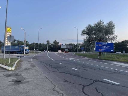 Billboard A in Tatsenki, 12х3  Dniprovs'ke sose, trasa N-01 "Kiiv-Znam'anka", km 39+050 pravo, na rozvilci dorig N-01 "Kiiv-Znam'anka" ta R-01 "Kiiv-Obuhiv", navproti AZS, livij Photo 1