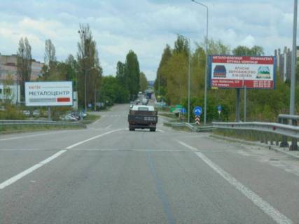 Billboard B in Obukhiv, 6х3  m. Obuhiv, pocatok st. Promislova, mist cerez trasu N-01 "Kiiv-Znam'anka", na rozi dorig na st. Kiivs'ka ta povorotu na Kiiv Photo 1