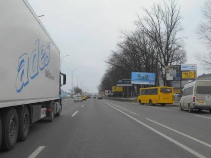 Billboard A in Chabani s. Cabani, trasa M-05 Kiiv-Odesa, km 14+975 livo, zupinka "Cabani-Gatne", navproti MegaMarketu Gatne, cerez 115m pisla povorotu na Gatne, Krukivsinu, Visneve Photo 1
