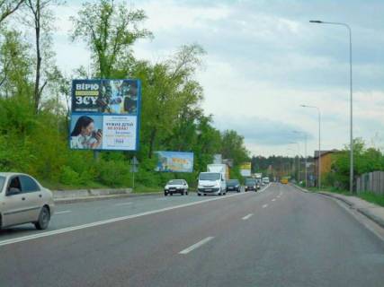 Billboard B in Gostomel, 6х3  смт. Гостомель, траса М-07 "Київ-Ковель", км 22+500 право, вул. Кулішова, 33, після повороту на с. Горенка, через 225м після автобусної зупинки "Горенка", верх Photo 1
