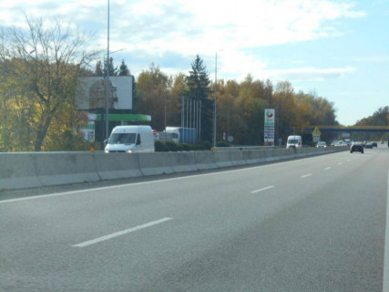 Billboard B in Kalynivka, 6х3  смт. Калинівка, траса М-05 Київ-Одеса, км 30+000 ліво, за 200м до АЗС АМІК, за 350м до автобусної зупинки "ст. Зоря", за 750м до повороту на вул. Залізнична Photo 1